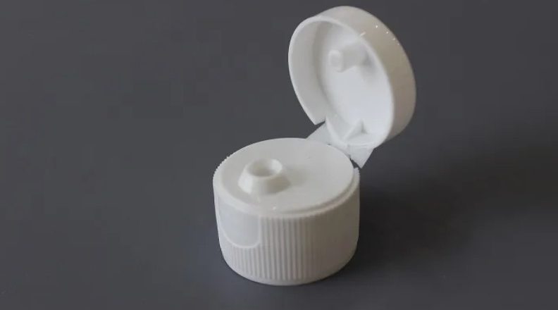 Крышки флип топ для бытовой химии: защита от протечек и удобство дозировки